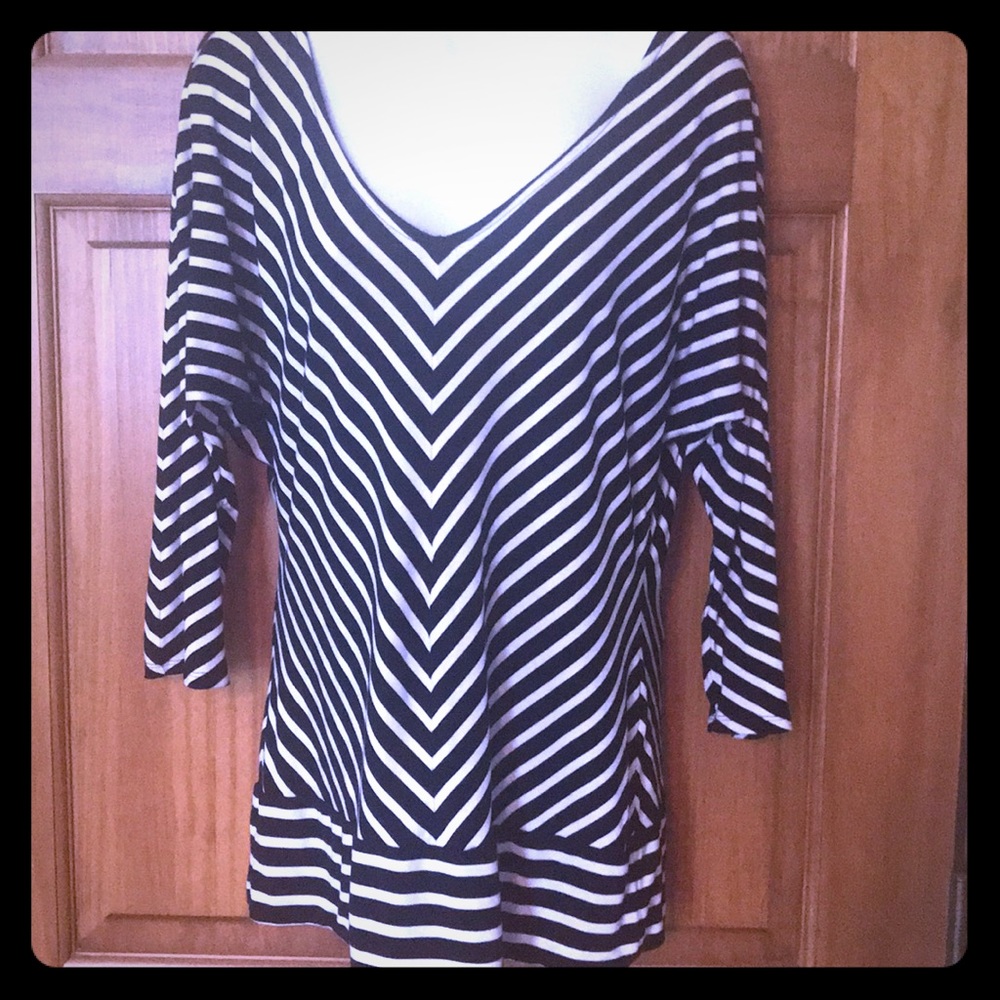 Diagonally striped banded tunic.
